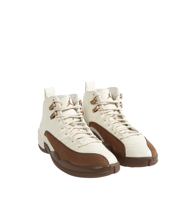 Image 2 of 5 - BROWN - Air Jordan 12 Retro "Fireside" Men's Shoes feature the iconic AJ12 silhouette in a seasonal colorway inspired by cozy autumn evenings. Crafted with a premium leather upper, this heritage basketball style combines Light Orewood Brown and Cacao Wow tones with the signature radial stitch detailing that pays homage to the original design worn by Michael Jordan. Full-length Air Zoom cushioning delivers responsive comfort, while a durable rubber outsole provides reliable traction for ever 