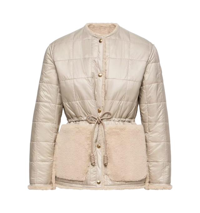 Image 1 of 1 - NEUTRAL - Moncler Womens Tipule Reversible Short Down Jacket is crafted from longue saison with a lightweight, water-repellent finish, this down-filled style features a reversible construction with plush faux fur on one side and smooth nylon on the other. Features snap-button front closure, round neckline, and maxi patch pockets. Exterior: 100% Polyamide / Nylon; Lining: Faux Fur; Padding: Down Fill. Made in Romania. 