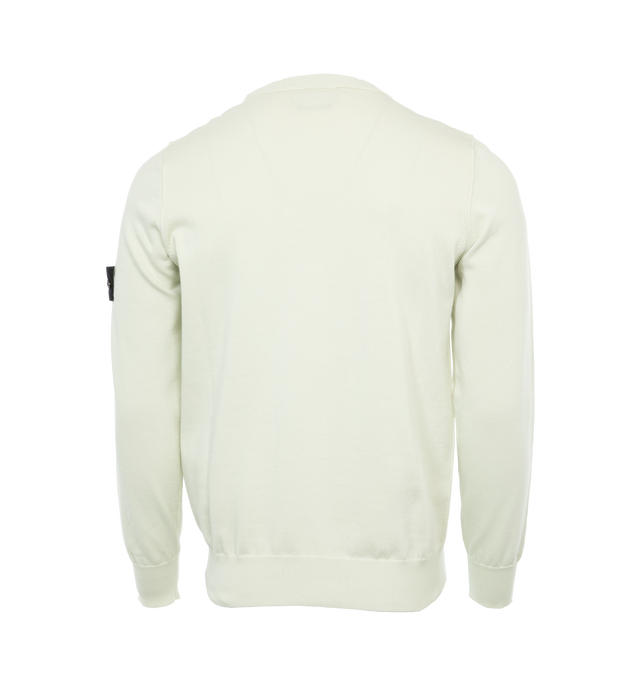 Image 2 of 3 - WHITE - STONE ISLAND Long Sleeve T-Shirt featuring rib knit crewneck, cuffs, and hem, embroidered eyelet vents at armscyes and detachable felted logo patch at sleeve. 100% cotton. Made in Turkey. 