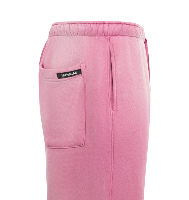 Image 3 of 3 -  PINK - NAHMIAS State Wide Sweatpants featuring elastic waist with drawstring, natural faded vintage appearance, side pockets, back patch pocket, logo on leg, loose fit and bungee cord at hem. 100% cotton.  