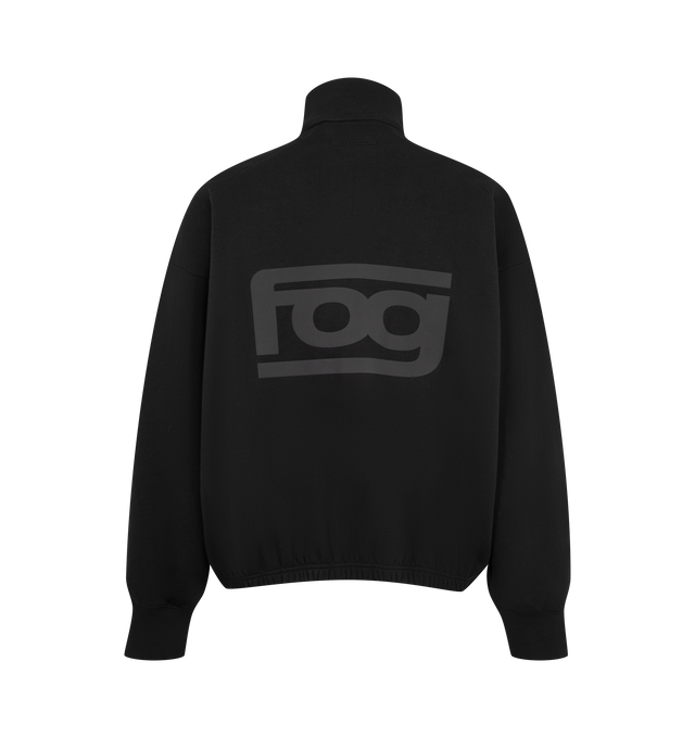 Image 2 of 2 - BLACK - Fear of God ESSENTIALS Men's Classic Track Jacket is crafted from heavyweight 380 GSM cotton-blend fleece and features a classic relaxed-fit silhouette with a full-zip front closure and high neckline. Designed with dual racing-inspired Essentials embossed suede fleece patches at the front shoulders and a bold FOG puff-print graphic across the back, this elevated track jacket is finished with side pockets, rib-knit cuffs, an elasticized hem, and a signature Essentials label at the back 