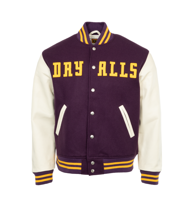 PURPLE - HUMAN MADE Varsity Jacket featuring rib knitted collar, front snap tab closure, two side waist pockets, soft viscose lining, rib knitted cuffs and hemline. 90% wool, 10% nylon. Sleeve: cow leather. Lining: 100% polyester.