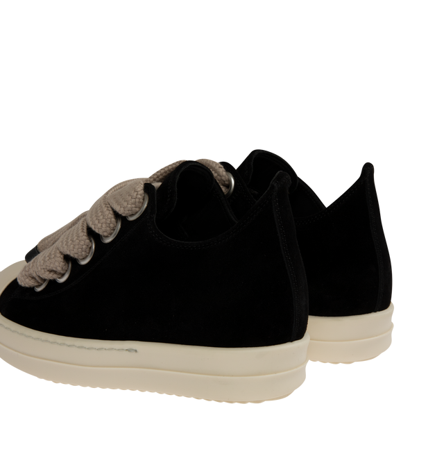 Image 3 of 5 - BLACK - Rick Owens Womens Jumbo Lace Low Sneakers are crafted from suede leather. Feature a low-top silhouette, oversized lace-up closure, calf leather toe cap, padded collar, shark-tooth thermoplastic rubber outsole, and signature bumper sole. Upper: 100% Suede Leather; Toe: 100% Calf Leather; Lining: 100% Calf Leather; Insole: 100% Calf Leather; Outsole: 100% Thermoplastic Rubber. Sole Height: 3.5 cm. Made in Italy. 