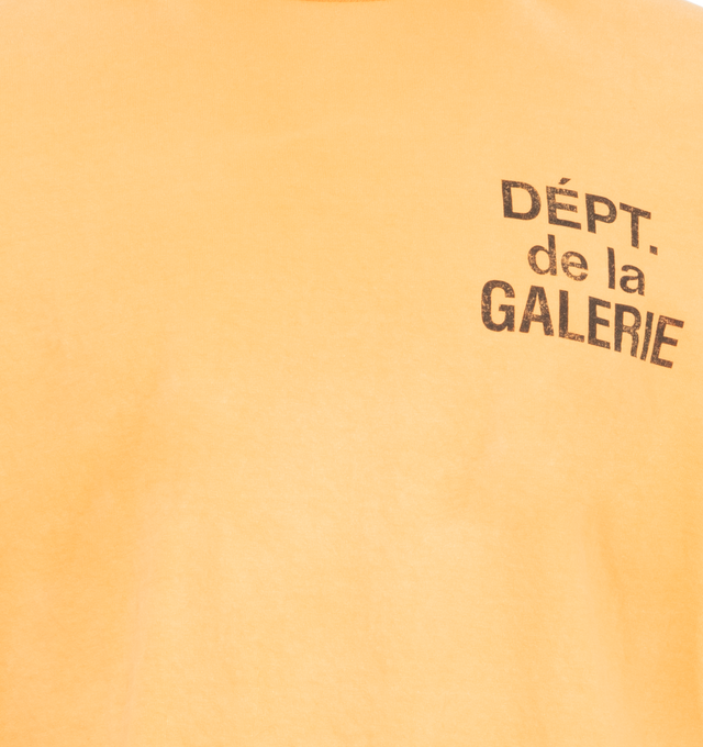 Image 3 of 4 - ORANGE - Gallery Dept. classic long sleeve tee in a boxy and relaxed fit with signature French logo and a vintage, worn look. Made in Los Angeles, CA. Material: 100% Cotton.  