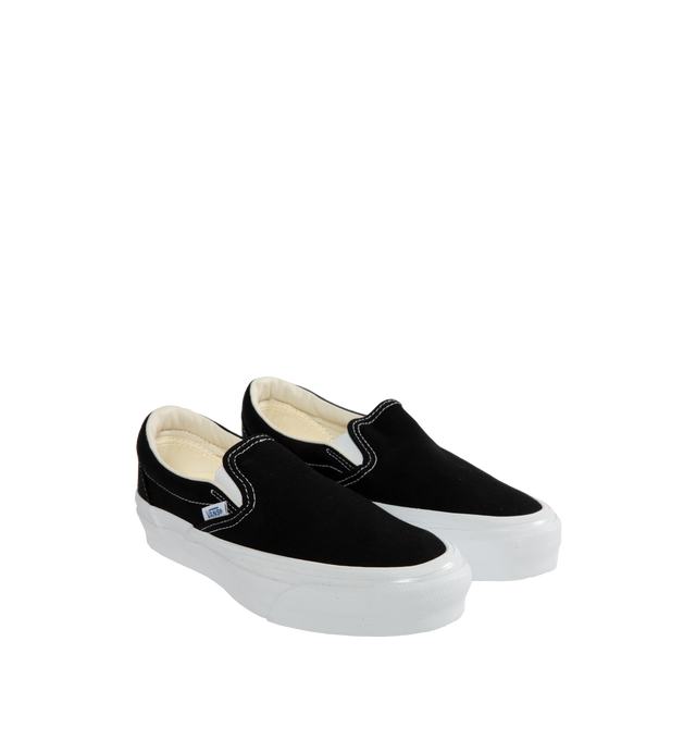 Image 2 of 5 - BLACK - VANS U Slip-On Reissue 98 Sneaker featuring padded collar and stretch gore for added comfort, round toe, slip on, lower collar around the ankle and higher collar above the heel. Canvas upper and lining, rubber sole. 