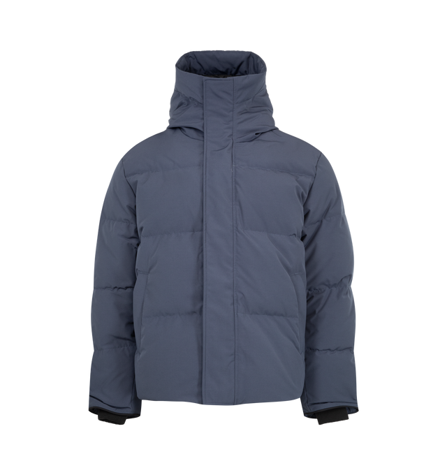 Image 2 of 4 - BLUE - Canada Goose Men's Seymour Parka is crafted from Recycled Organic Arctic Tech and features a quilt-through construction designed for protection in extreme cold-weather conditions. The parka is equipped with an adjustable snorkel hood, a tricot-lined chin guard, and a concealed snap placket over a front zip closure for enhanced coverage. Functional details include interior backpack straps for hands-free carrying, recessed rib-knit cuffs reinforced with CORDURA, two exterior zip pockets, 