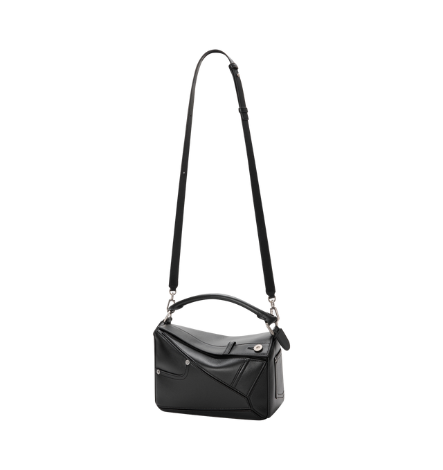 Image 3 of 4 - BLACK - LOEWE Panta Small Puzzle Bag featuring distinctive geometric lines and cuboid form. This small version is crafted in shiny calfskin with denim trousers-inspired details, shoulder, crossbody or hand carry, detachable and adjustable strap, zip closure with calfskin pull, one external rear pocket, one internal slip pocket, herringbone cotton canvas lining and embossed Anagram. Shiny calf. 16.5 cm x 24 cm x 10.5 cm. Made in Spain. 