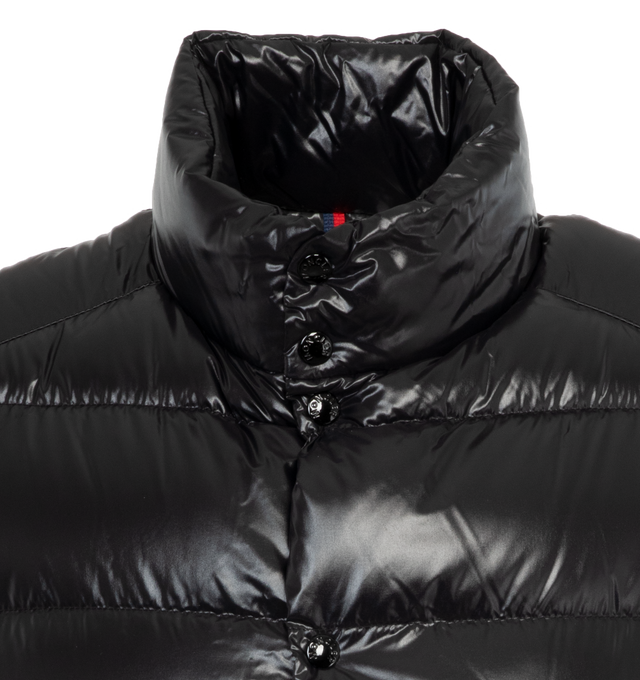 Image 3 of 3 - BLACK - MONCLER Tibb Shiny Puffer Vest featuring nylon laqu lining, down-filled, zipper closure, collar with snap button closure, zipped pockets and zipped internal pockets. 100% polyamide. Padding: 90% down, 10% feather. 