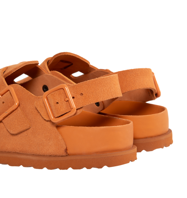Image 3 of 4 - ORANGE - Birkenstock's Tokio a closed-toe clog in a regular width. The iconic Tokio sillhouette closely follows the contours of the foot featuring adjustable heel and arch straps. Upper: Luxurious fine flesh out suede, a full grain leather that has been flipped to use the fuzzy side. Footbed: Anatomical shaped BIRKENSTOCK cork-latex footbed, covered with premium, color-matching smooth nappa leather. Sole: EVA outsole with a 3mm EVA welt updates the standard die-cut outsole while still ensurin 