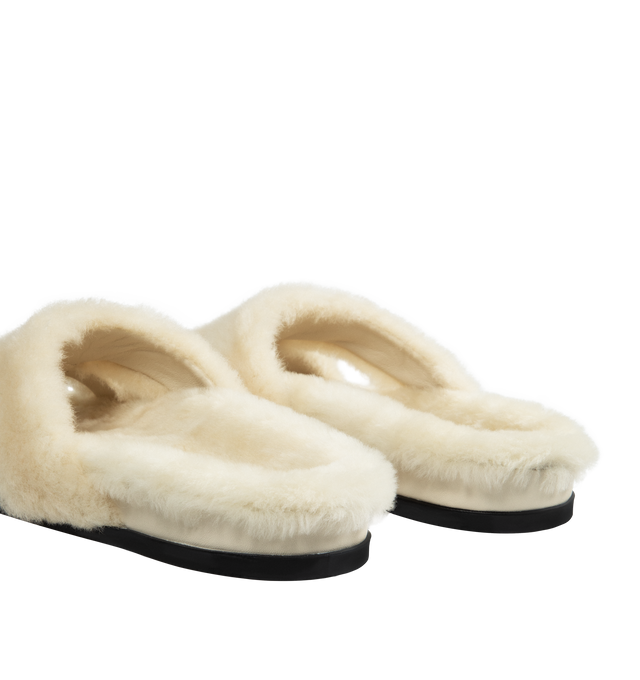 Image 3 of 4 - WHITE - MANOLO BLAHNIK Chilpa Genuine Shearling Slide Sandal featuring genuine-shearling upper and lining and rubber sole. 1" platform. Made in Italy. 