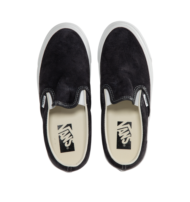 Image 5 of 5 - BLACK - VANS LX Classic Slip-On 98 Sneakers featuring canvas slip-on sneakers, elasticized gussets at vamp, padded collar, logo flag at outer side, rubber logo patch at heel, grained leather and canvas lining, textured rubber midsole, treaded rubber sole and contrast stitching in white. Upper: textile. Sole: rubber. Made in Philippines. 