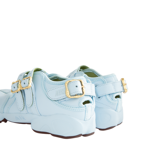 Image 3 of 5 - BLUE - Nike Women's Air Rift Shoes feature the iconic split-toe silhouette inspired by barefoot running and designed for effortless everyday comfort. Crafted with a genuine leather upper that softens and develops character over time, this distinctive style is equipped with adjustable buckle straps for a secure fit and a Nike Air unit in the heel paired with a plush foam midsole for lightweight cushioning. Finished with rugged rubber outsole detailing for enhanced traction and durability. Main 