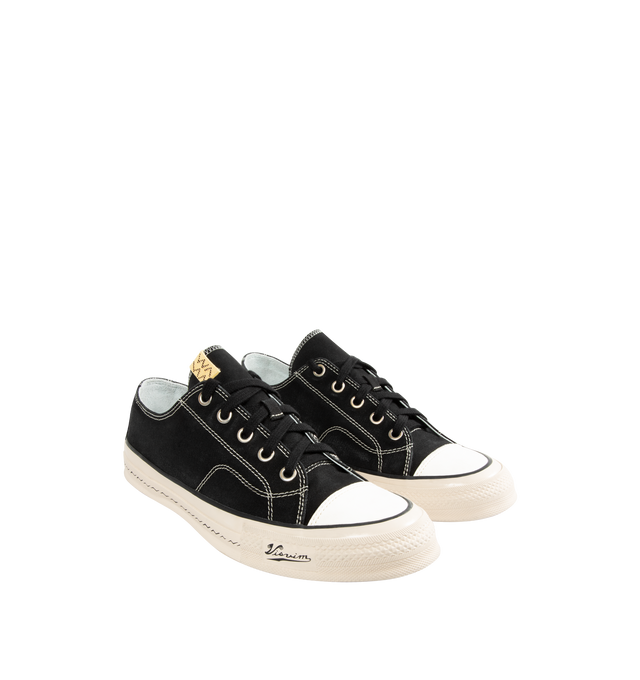 Image 2 of 5 - BLACK - VISVIM Skagway L.T. Lo Leather-Trimmed Canvas Sneakers featuring lace-up, hard-wearing canvas, leather trims, high logo-printed foxing and Vibram rubber soles. 