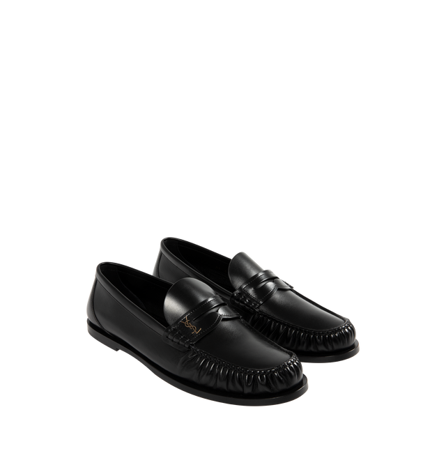 Image 2 of 4 - BLACK - SAINT LAURENT Ryan 05 Penny Loafers in leather featuring stacked heel, round moc toe, penny keeper strap with Cassandre hardware, leather outsole and slip-on style. Made in Italy. 