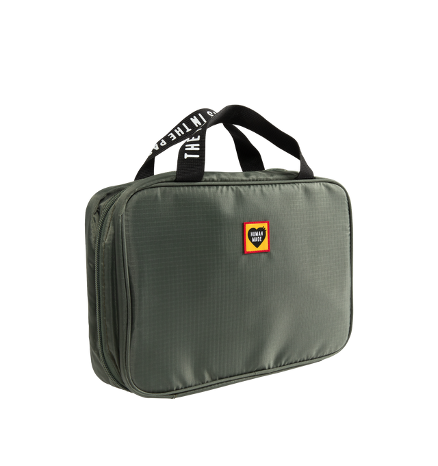 Image 2 of 3 - GREEN - HUMAN MADE Organizer Pouch featuring a tri-fold design, lightweight, durable ripstop fabric, iconic heart logo on the front, handle with a logo print, several multi-pockets and S-shaped hook attached for hanging storage. 100% polyester. 