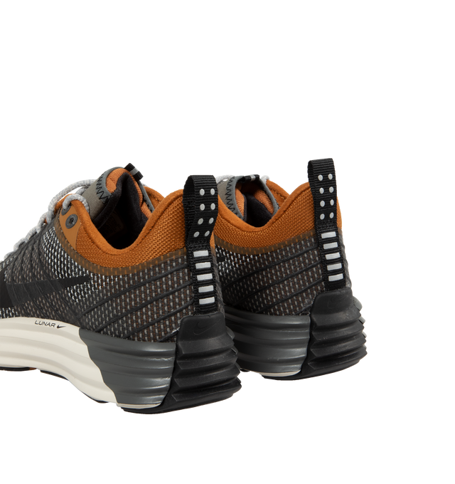 Image 3 of 5 - GREY - Nike Lunar Roam Sneaker featuring breathable mesh upper in desert bronze and metallic pewter colors, lace up style, TPU panels, foam midsole and rubber outsole. 