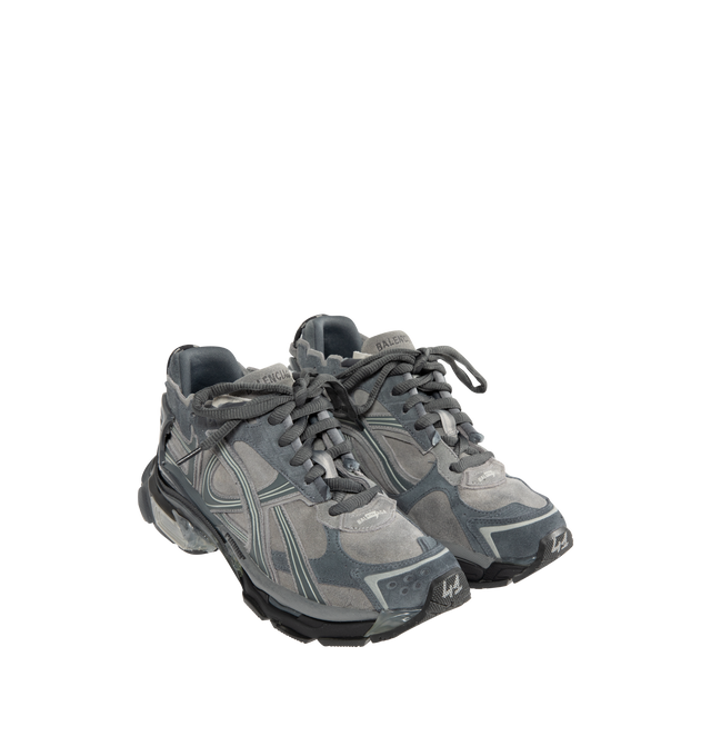 Image 2 of 5 - GREY - BALENCIAGA Runner Sneaker in grey suede cowskin, polyurethane and polyester featuring worn-out effect, printed size at the edge of the toe, debossed size at back, runner logo printed on exterior, Balenciaga logo embroidered on the tongue, Balenciaga logo at the back of the heel and Back pull-on tab. Upper: cowskin, polyurethane, polyester. Sole: rubber, TPU, EVA, polyurethane. Insole: foam. Made in China. 