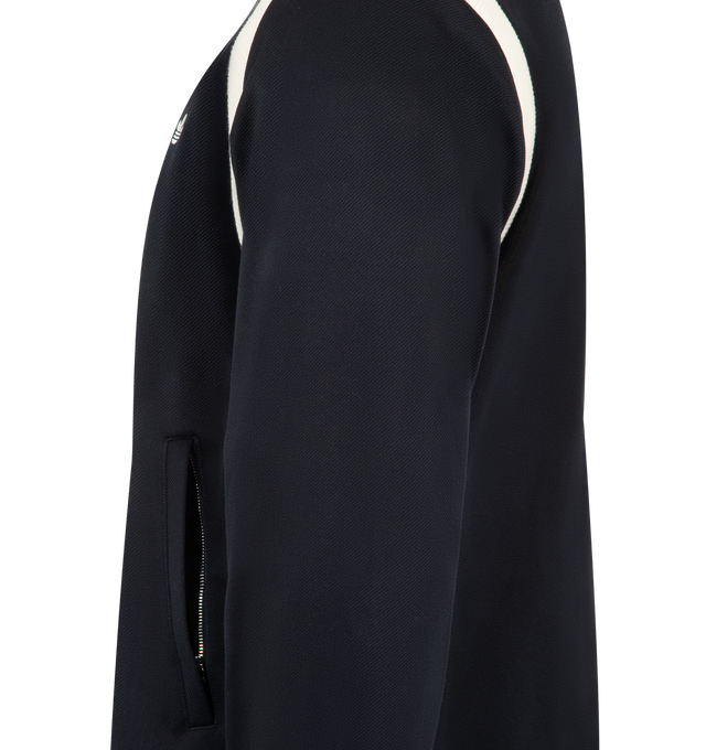 Image 3 of 3 - NAVY - ADIDAS X WALES BONNER Twill Track Top featuring funnel neck, full-zip closure, long sleeves with ribbed cuffs, stripes at shoulders, logos at left and right chest, two side hand pockets and ribbed hem. 57% polyamide, 39% cotton, 4% spandex. Lining: 100% cotton. 