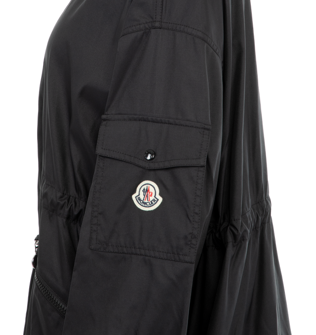 Image 3 of 3 - BLACK - Moncler Adhemar Long Parka has a pull-out hood with canvas lining, drawstring fastenings, front zipper closure, zip pockets, elastic cuffs, and pockets with snap button closures. Micro mesh lining. 100% micro canvas.  