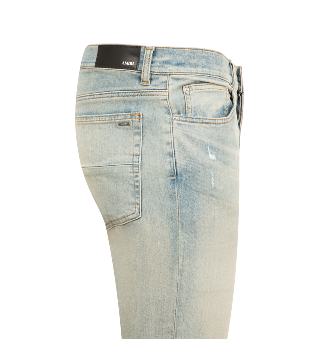Image 3 of 3 - BLUE - AMIRI Stack Jeans featuring regular rise, five-pocket style, full length, fitted through skinny legs, button and zip fly and belt loops. Polyester/elastane. Made in USA. 