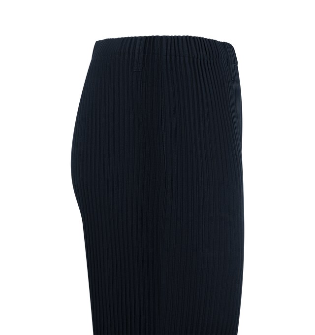 Image 3 of 3 - NAVY - ISSEY MIYAKE Basics Pants featuring signature pleated style, straight fit, lightweight fabric, breathable polyester, elastic waistband and button fly. 100% polyester. Made in Philippines. 