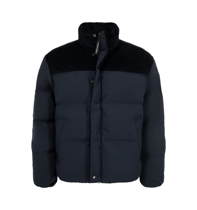 Image 2 of 4 - NAVY - Canada Goose Men's Sterling Puffer Jacket is crafted from Arctic Tech fabric and features a puffer silhouette with contrasting cotton corduroy at the shoulders and collar for a Western-inspired look. Designed with a concealed snap placket over a front zipper, an exposed bottom snap, an adjustable drawcord hem, and recessed rib-knit cuffs to help retain warmth. Main Material: Arctic Tech. Contrast: Cotton Corduroy. Closure: Hidden Snap Placket with Front Zip. Pockets: Two Snap-Welt Exte 