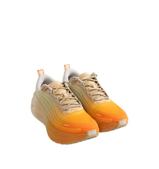 Image 2 of 5 - ORANGE - Nike Men's Vomero Plus Cheat Day SP Sneakers are crafted with engineered mesh uppers and feature a max-cushion performance silhouette inspired by the indulgent spirit of a "Cheat Day." Designed with a vibrant orange-dusted upper balanced by neutral tones, this special-edition style combines dual Air Zoom units with responsive ZoomX cushioning for exceptional comfort and energy return. Finished with a durable rubber outsole, lace-up closure, and signature Nike branding throughout. M 
