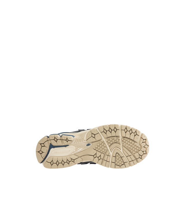 Image 4 of 5 - NAVY - NEW BALANCE 1906 Utility Sneaker featuring a cushioned midsole, breathable mesh upper and supportive construction, stability web outsole technology and lace-up closure. 
