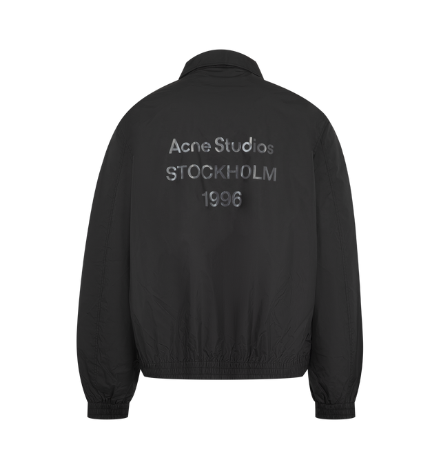 Image 2 of 3 - BLACK - Acne Studios Mens Nylon Jacket is crafted from lightweight recycled nylon with a semi-shiny finish. Features a regular fit, below-waist silhouette, pointed collar, front zip closure, side-seam pockets, elasticized cuffs and hem, full lining, and Acne Studios 1996 logo at the back. Main Material: 100% Nylon; Lining: 55% Polyester, 45% Viscose. Made with recycled nylon and recycled polyester/FSC-certified viscose lining. Made in Portugal. 