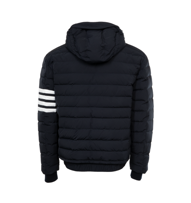 Image 2 of 4 - NAVY - THOM BROWNE Down Filled Ski Jacket has an attached hood, knit cuffs, side zip pockets, signature four bar stripes at sleeve, and ribbed cuffs. 100% polyester. Padding: 80% White Goose Down, 20% White Goose Feathers. 