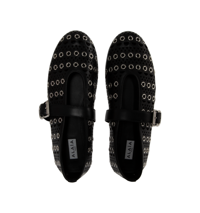 Image 4 of 4 - BLACK - ALAA Signature ballet flats inspired by classical Japonese shoes featuring buckle strap on top, round toes, and leather perforated with the iconic "Vienne" motif and enhanced by metallic eyelets. Lambskin upper and lining, rubber sole. Made in Italy. 