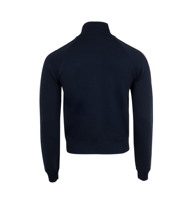 Image 2 of 3 - NAVY - Wales Bonner Tide Track Jacket featuring knit viscose-blend, rib-knit stand collar, hem, and cuffs, zip closure, logo embroidered at chest, welt pockets and stripes at raglan sleeves. 75% viscose, 23% polyester, 2% nylon. Made in China. 