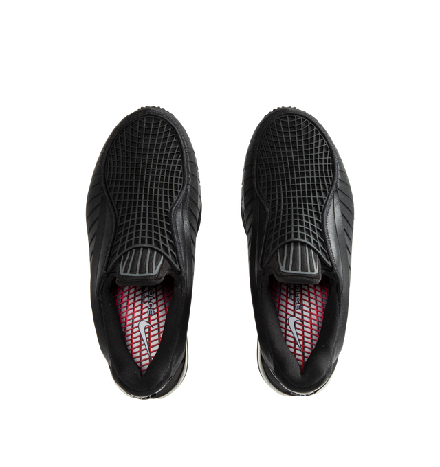 Image 5 of 5 - BLACK - Nike Women's Air Max Dolce Shoes revive an iconic silhouette that seamlessly transitions from casual everyday wear to elevated styling. Originally rooted in performance running, this distinctive design retains the signature details that made it a standout within the Air Max family, including a laceless molded upper, supportive overlay cage, and visible Max Air cushioning in the heel. Finished with a foam midsole for enhanced comfort, the Air Max Dolce delivers lightweight cushioning a 