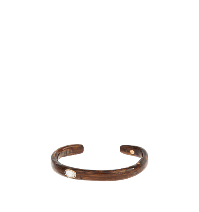 Image 1 of 2 - BROWN - Dezso by Sarah Beltran cuff bracelet made of coral set with a rough cut polki diamond. For personal consultation and detailed information about jewelry, please contact our dedicated stylist team at: personalshopping@hirshleifers.com 