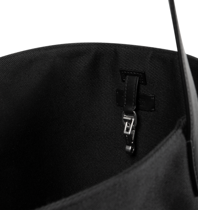 Image 3 of 3 - BLACK - THE ROW Large N/S Park Tote Bag featuring classic tote bag in cotton canvas with interior toggle closure and flat handle. 9 x 8.5 x 15 in. Handle: 11 in. drop. 100% cotton. Made in Italy. 