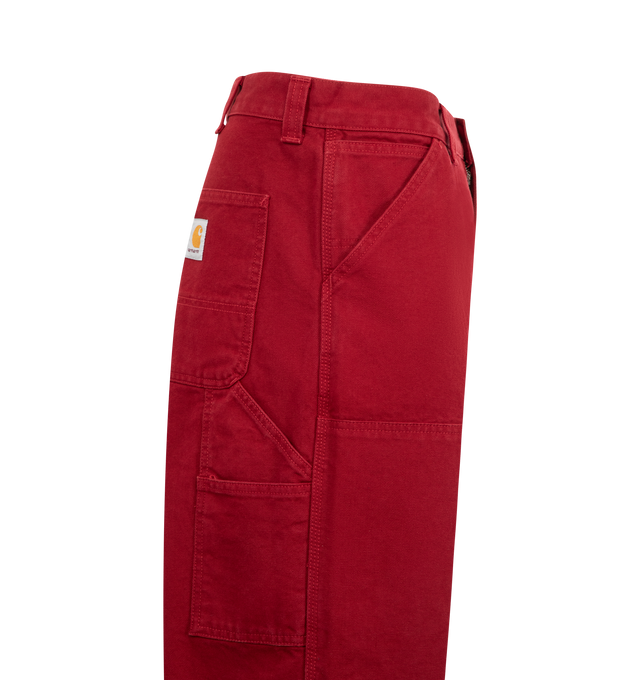 Image 3 of 3 - RED - CARHARTT WIP Double Knee Pant featuring zip fly with button closure, front tonal patches with gold-tone rivets, classic 5-pocket design, hammer loop and utility slip pockets at back and canvas fabric. 100% organic cotton. 