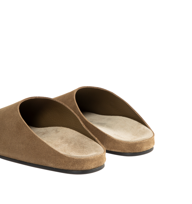 Image 3 of 4 - BROWN - THE ROW Hudson Slide in Suede featuring relaxed slip-on shoe in natural suede with round toe, contoured footbed, and rubber sole. 100% calfskin leather. Rubber sole. Made in Italy. 