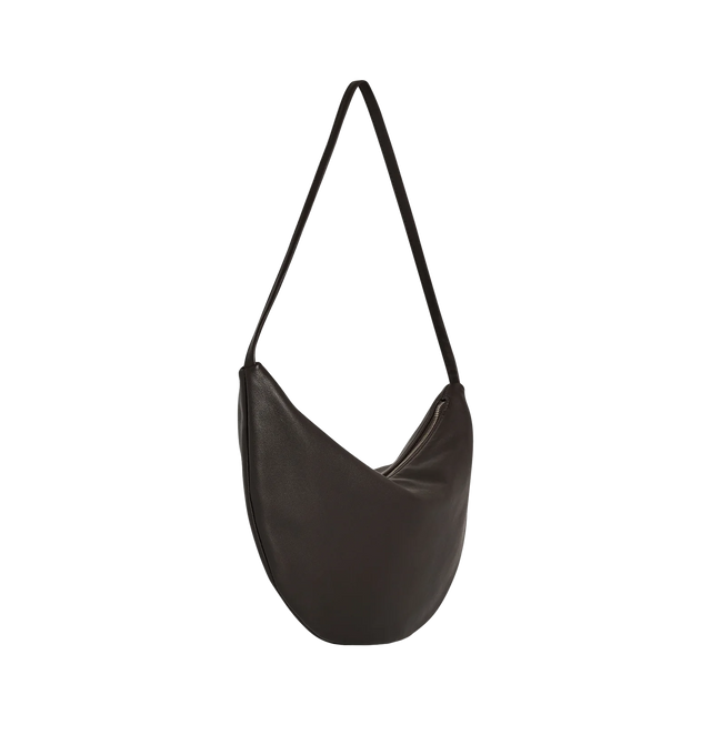 Image 2 of 3 - BROWN - THE ROW Small Izzy Bag featuring contoured shoulder bag in ultrasoft lambskin leather with slim strap and zipper closure. 13 x 7.5 x 0.8 in. Antique silver hardware finishing. 100% lambskin leather. Made in Italy. 