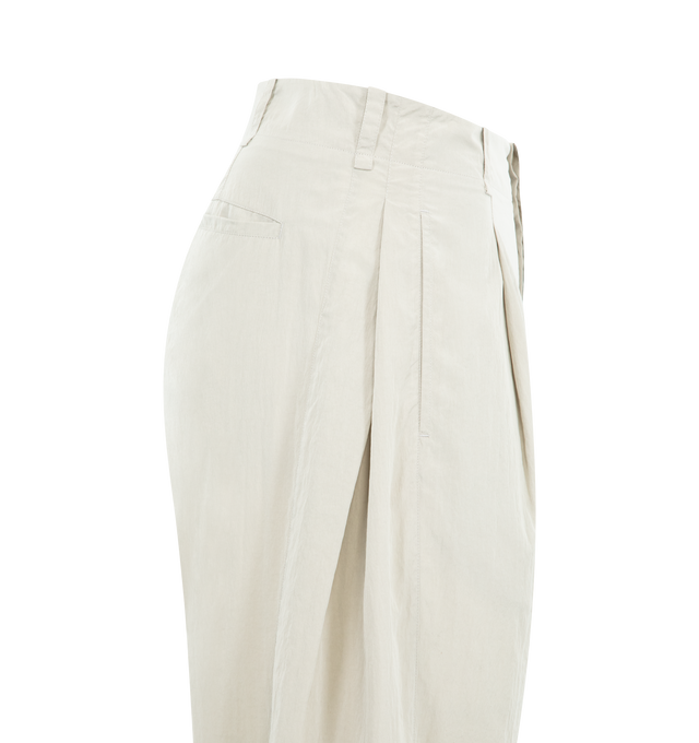 Image 4 of 4 - WHITE - THE ROW Malaya Pant featuring relaxed mid-rise pant in softly crinkled technical silk with wide straight leg, paneled sides and side seam pockets. 65% silk, 35% nylon. Made in Italy. 