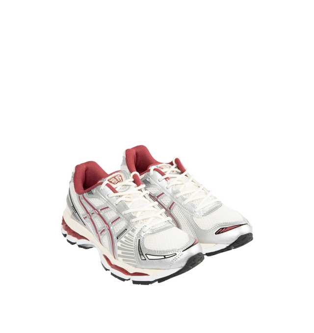 Image 2 of 5 - RED - ASICS Gel-Kayano 12.1 Sneaker featuring breathable mesh underlays, GEL-NIMBUS17 tooling system, FLUIDRIDE technology, rearfoot and forefoot GEL technology and dope dyed recycled sockliner mesh. 