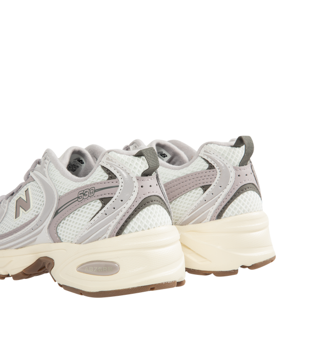 Image 3 of 5 - GREY - NEW BALANCE 530 Sneaker featuring mesh and textile upper with rubber sole, lace-up front, ABZORB midsole cushioning for compression resistance, signature N logo patches at side panels and padded low-cut collar with back pull-tab. 
