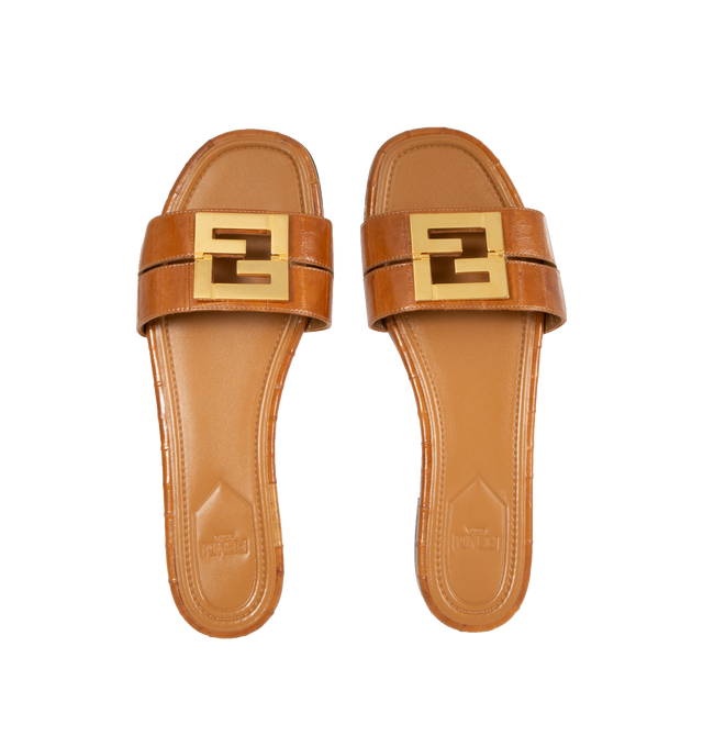 Image 4 of 4 - BROWN - FENDI FFold Slide Eel Leather Sandals featuring slip-on flats with square toes and two wrap-around bands, metal FF detail, with a special design that includes a functional hinge in the center. Made of shiny beige eel leather. Gold-finish metalware. Made in Italy. 