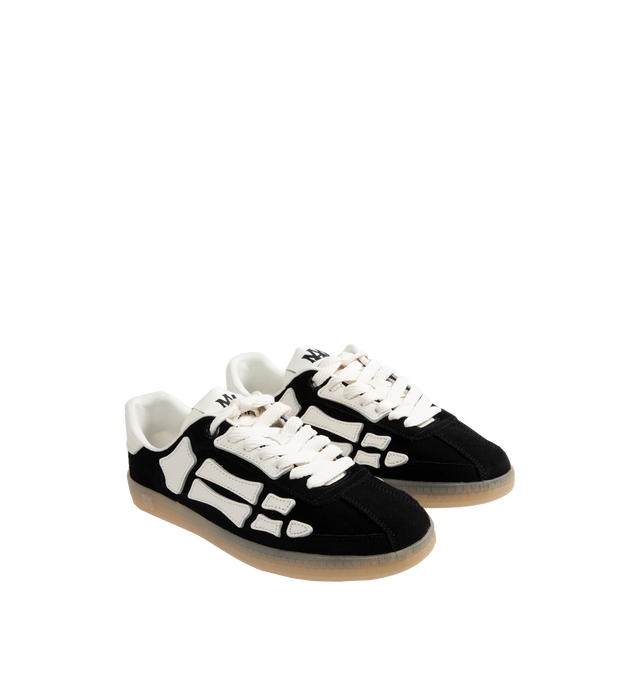 Image 2 of 5 - BLACK - Amiri Pacific Bones Sneakers are a lace-up style with leather bone appliques and rubber soles. Leather and rubber. Made in China.  