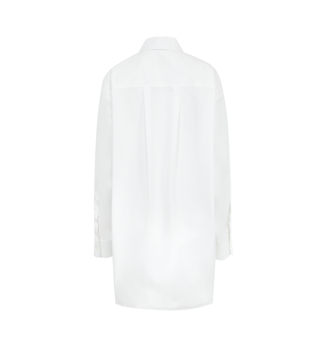 Image 2 of 2 - WHITE - Loewe Women's Shirt in lightweight soft cotton poplin featuring a curved hem.Relaxed fit, long length, classic collar, concealed button front fastening, buttoned cuffs, and seam pockets. Made in Italy. 