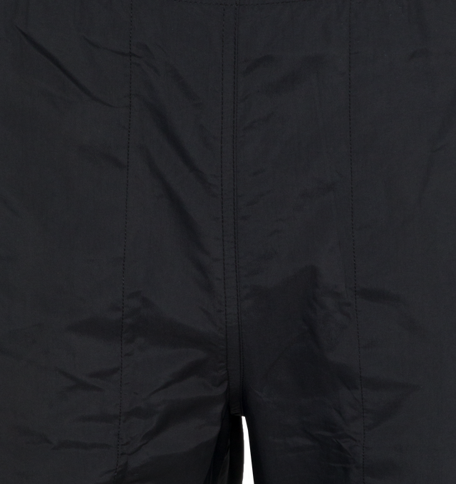 Image 4 of 4 - BLACK - NOAH CORE SWIM TRUNK crafted from 100% nylon with poly mesh liner. Elastic drawstring waist, on-seam front pockets, flap back pocket with snap closure and drain vent.  Ultralight and quick-drying, as high-performing in the water as they are on land. Featuring solid proportions, functional pockets, an essential summer staple. Made in Portugal. 