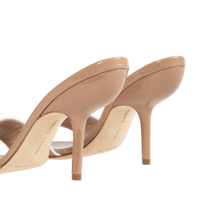 Image 3 of 4 - NEUTRAL - MANOLO BLAHNIK Helamu Mules featuring patent leather, open toe, toe strap with contrast lamb nappa edging and angular stiletto high heel. 95% calf patent, 5% lamb nappa. Sole: 100% calf leather. Lining: 100% kid leather. 105MM. Made in Italy. 
