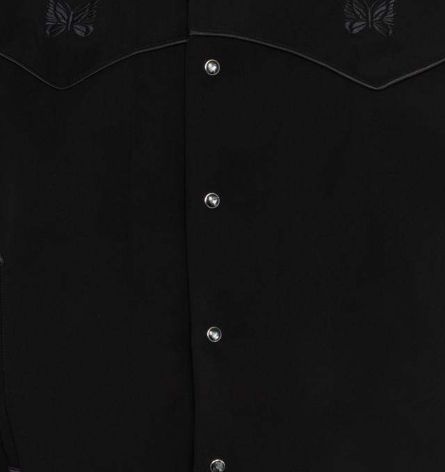 Image 3 of 3 - BLACK - NEEDLES Cowboy Jacket featuring stretch polyester twill, piping and logo embroidered throughout, spread collar, dropped shoulders, press-stud closure, welt pockets, two-button barrel cuffs and darts at back. 89% polyester, 11% polyurethane. Made in Japan. 