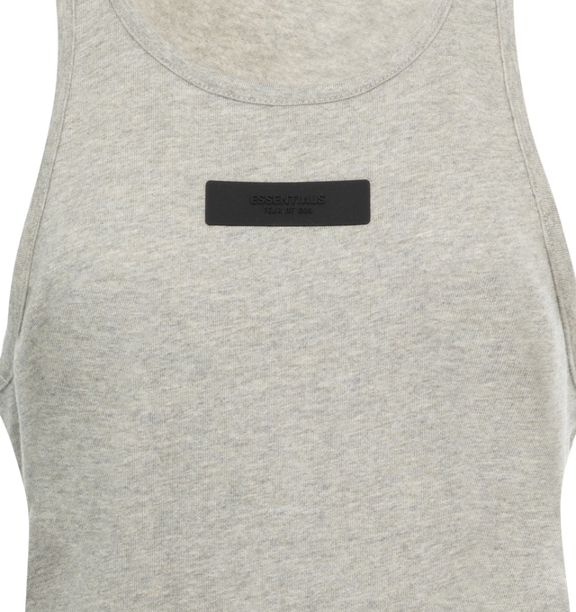 Image 2 of 2 - GREY - FEAR OF GOD ESSENTIALS Tank Top featuring a U-neckline, fixed straps, a relaxed body with dropped armholes, and minimalistic rubber brand labels at the upper back and chest. 53% cotton, 40% polyester, 7% rayon. 