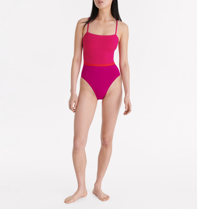 Image 2 of 6 - PINK - ERES Ara Tank One-Piece Swimsuit featuring thin straps, contrasting reinforced band around the waist, wraparound neckline seam and straight back straps. 84% Polyamid, 16% Spandex. Made in Italy. 