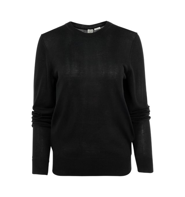 Image 1 of 2 - BLACK - TOTEME Fine crew knit sweater featuring slim arms, straight silhouette, a crew neck and long sleeves. 75% wool RWS, 25% silk. 